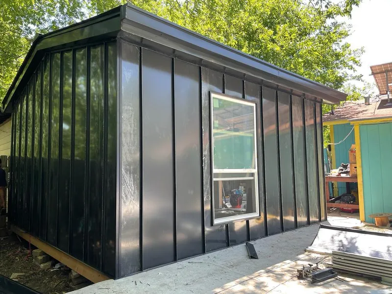 Black standing seam metal wall panels for Roof Inspection in Charleston